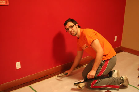 andy laying wooden flooring